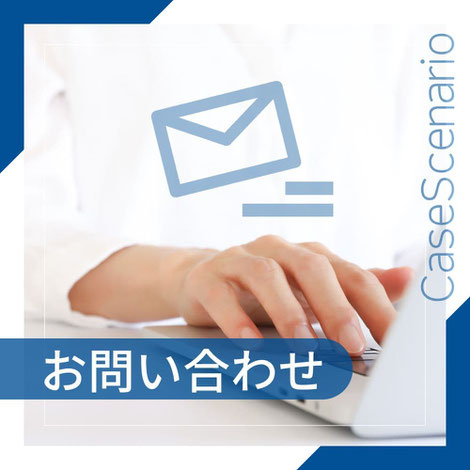 ノートパソコンのキーボードをタイピングする手元のクローズアップ画像。
