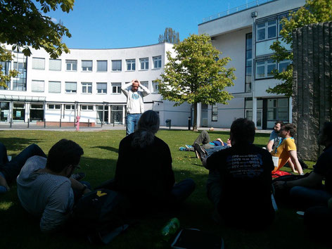 Johannes presenting outside in the sun