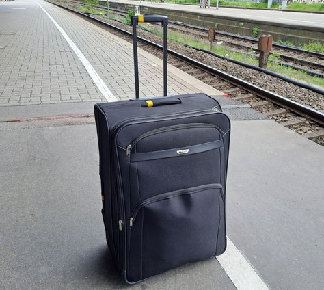 Leistungen einer Reisegepäckversicherung und was versteht man unter einer Zeitwert-Erstattung?