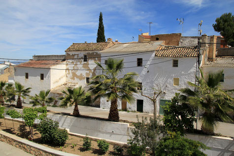 A view on the street along the channel in Escúzar