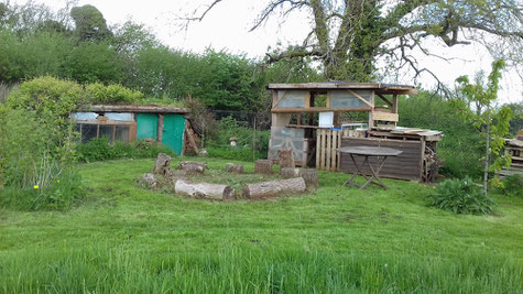 Chill out area, the building on the left is the root cellar