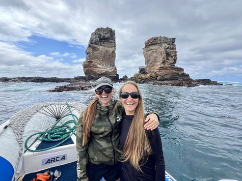 Shark researcher Andy Fragola and Jenny Waack in front of the famous Darwin's Arch/ Pillars - Galapagos Shark Diving
