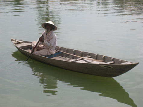 Mann auf einem Boot, Mekong Delta