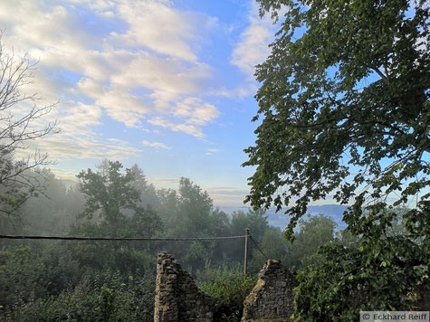 light fog wafts around the castle the next morning