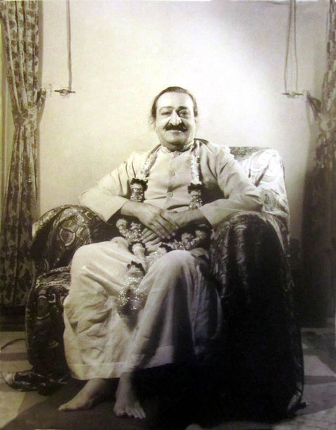 Baba seated with garland, Poona, 1959