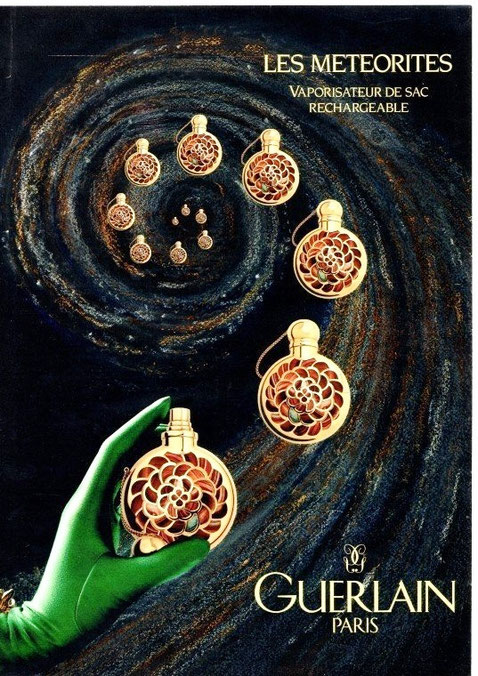 GUERLAIN - PUBLICITE POUR LES VAPORISATEURS DE SAC "LES METEORITES"
