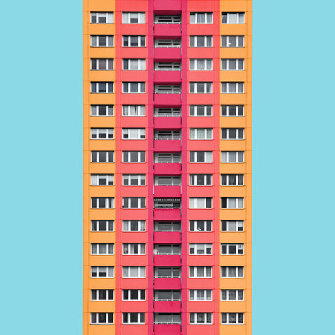 Berlin Plattenbau DDR GDR east Berlin socialist high rise. Colorful modern minimal architecture photography. facade design inspiration in yellow orange and pink