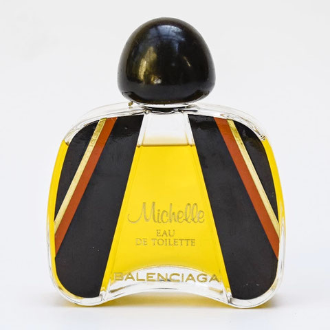 GROS PLAN SUR LE FLACON MICHELLE, VAPORISATEUR EAU DE TOILETTE 50 ML