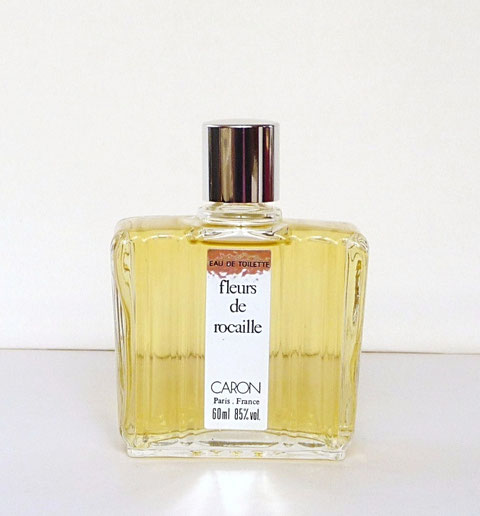 FLACON EAU DE TOILETTE 60 ML INCLUS DANS LE COFFRET CI-DESSUS. BOUCHON ARGENTE, ETIQUETTE ARGENT.
