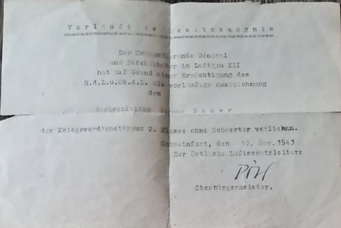 Vorläufiges Besitzzeugnis für eine Auszeichnung, unterzeichnet von Oberbürgermeister Pösl 1943
