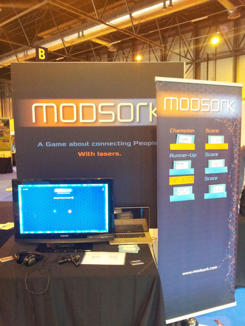 MODSORK booth with public leaderboard at Madrid Games Week