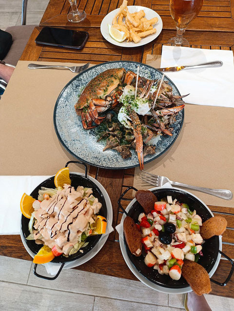 3 plastos de mariscada 