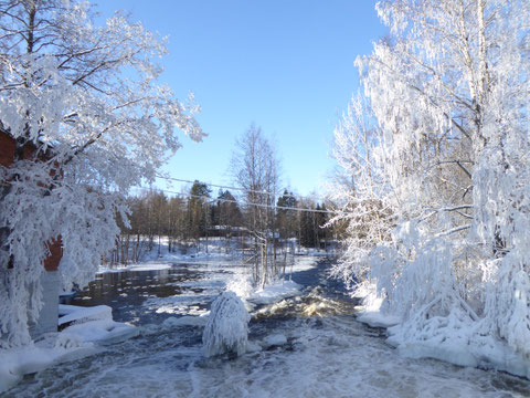 Winter Wonderland Finland. Ice fishing. River Virtaa.