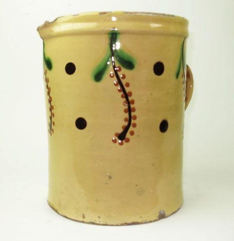 Folk art, very large ochre glazed slip decorated jug