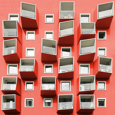 playful balconies ørestad copenhagen architecture modern  colorful photography minimal facade design inspiration red 