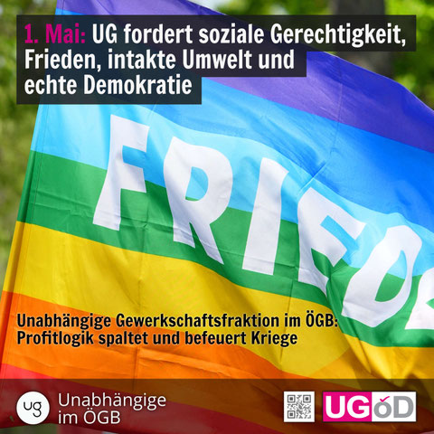 Eine Regenbogenfahne mit der Aufschrift FRIEDE