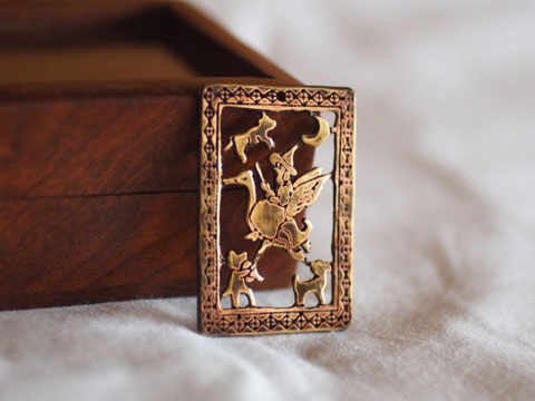 Mother Goose Pendat top
