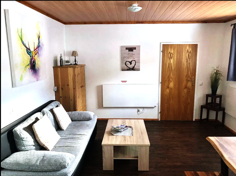 Unser Wohnzimmer im Apartment mit großer kuschliger Schlafcoach