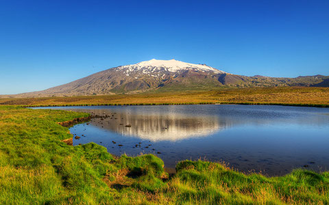 El volcán Snæfellsjökull (Islandia) es el punto de entrada de los protagonistas hacia las entrañas de nuestro planeta en la novela ‘Viaje al centro de la Tierra’. Foto: Axel Kristinsson-Wikimedia 