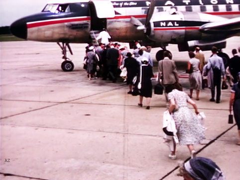 Meher Baba and his entourage boarding the flight  ( 320 ) from Wilmington NC to Washington DC. Image captured by Anthony Zois from a film by Sufism Reoriented.