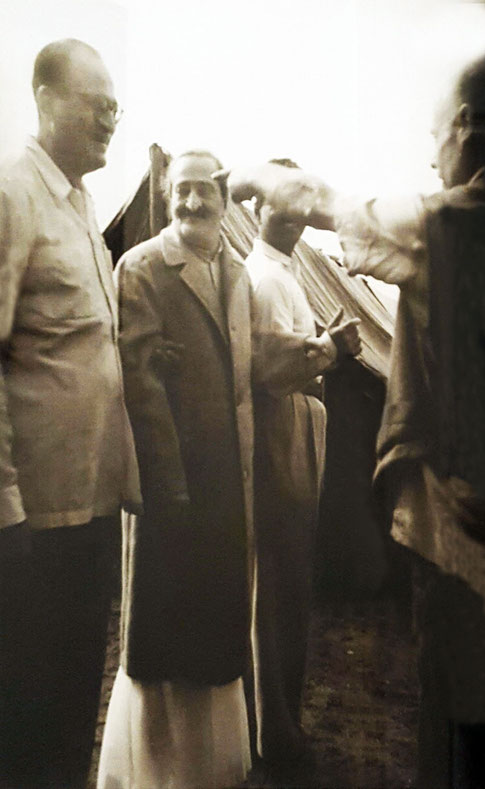 9. Meher Baba with Nariman, Eruch with Francis Brabazon pointing to something. Courtesy of Avatar's Abode Archives.