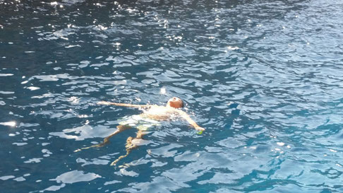 Floating in the not so secret cove and enjoying the healing powers of the Mediterranean.