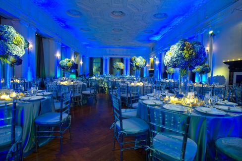 Dinner room, decorated with round tables for an elegant gala dinner