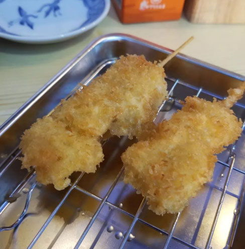 Stall:Ultra C  Food:fried pork and negi on skewers ,Beef hormone, squid