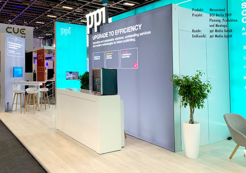 Referenzbilder Messebau für ppi Media GmbH auf der DCX Berlin. Planung, Produktion und Montage.