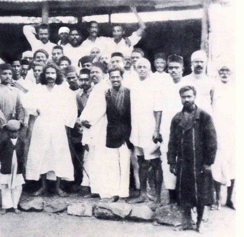 India : Padri is on the rear right with his hand holding the roof. Courtesy of Lord Meher - p.1233
