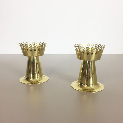 This candlelight holder was designed by Hans Agne Jakobsson in the 1950s and produced by his own company, Hans Agne Jakobsson A. B. in Markaryd, Sweden. This item is made of solid metal in brass. super rare, here as a set of two. the candleholder holders 