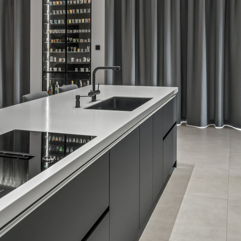 grey kitchen island with sintered tone worktop