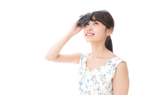 汗をかく女性