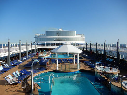 Several Hot Tubs, Pools, Bar, and Cafes can be Found on the Pool Deck