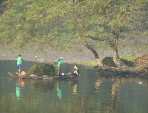 2015 Workers clearing weeds from the Bakong Moat during our stay in Cambodia