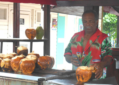 2016 A Coconut Vendor in Downtown Marigot, St. Martin was Doing a Brisk Business