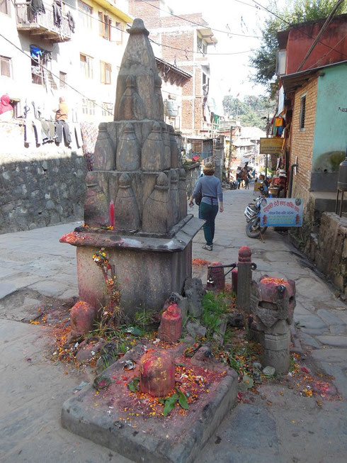 2013 A Linga Stone on a Bhaktapur Street with many Offerings left by the Faithful