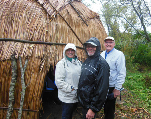 Three Wet Passengers are about to Enter a Wampanoag Hut at Plimoth Plantation