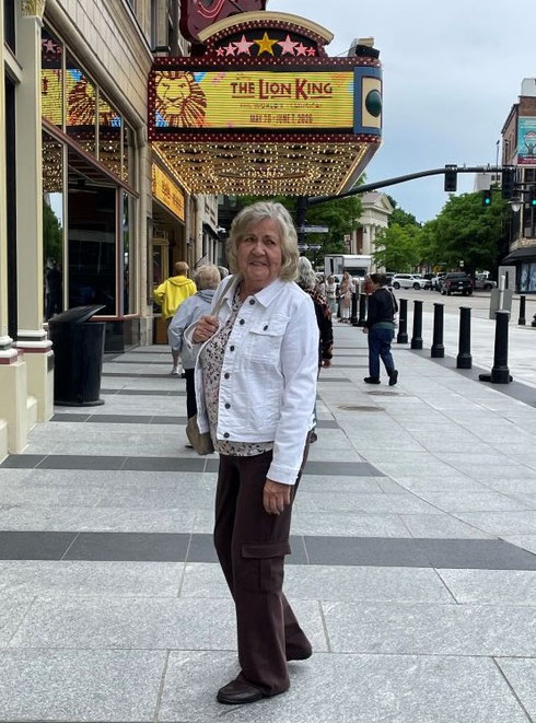 A passenger about the enter the Providence Performing Arts Center for Lion King