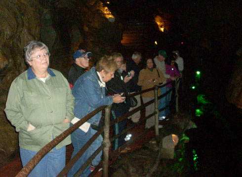 Standing at the Rail Overlooking the Underground River 156 feet Below Ground