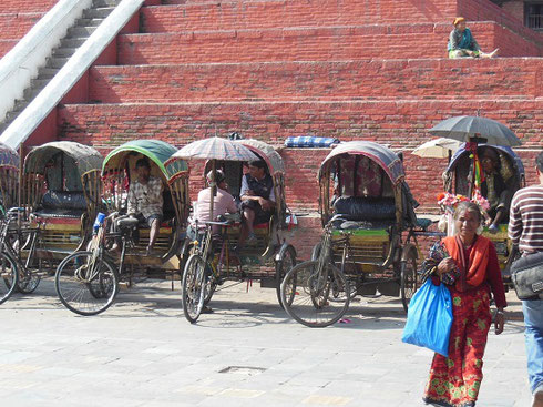 2013 A Line of Rickshaws are ready for hire at Durbar Square in Kathmandu