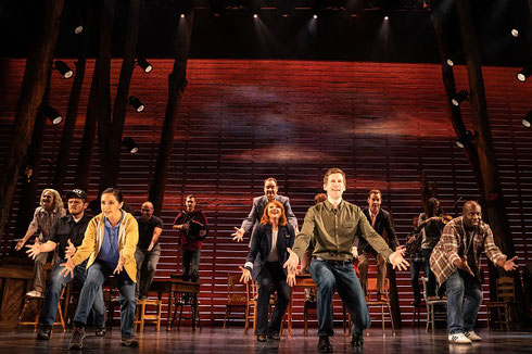 The cast performs a dance number from Come From Away