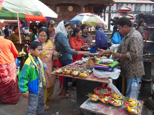 2013 Vendors sell a Variety of Offerings for Presentation at the Temples in Durbar Square