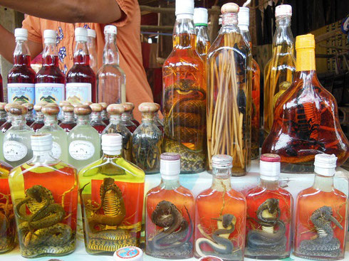 2015 For sale in the little village is Rice Wine with Snakes and Scorpions - good for virility