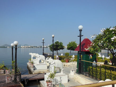 2013 Figures of Elephants stand guard on an Island in Udaipur Lake