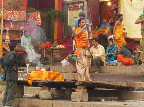 2013 A Priest Performing a Ceremony on the Steps of the Ganges in Varanasi