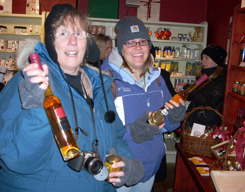Two of our Travelers Shopping at one of our Tour Stops - Shop 'till you Drop!
