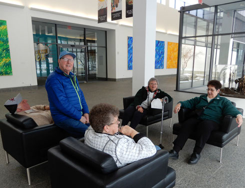 A group of our passengers found comfortable seating in the lobby of the Eric Carle Museum