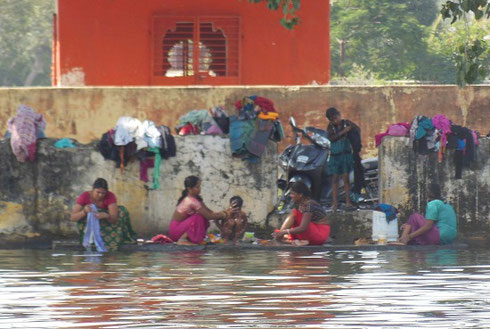 2013 Udaipur Lake is the scene of local women Washing Clothes and Children