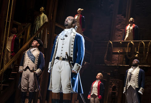 Actors in Military Uniforms on Stage in the Performance of Hamilton